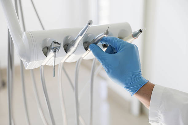 Professional Tooth Extraction technician working in Southport, NC